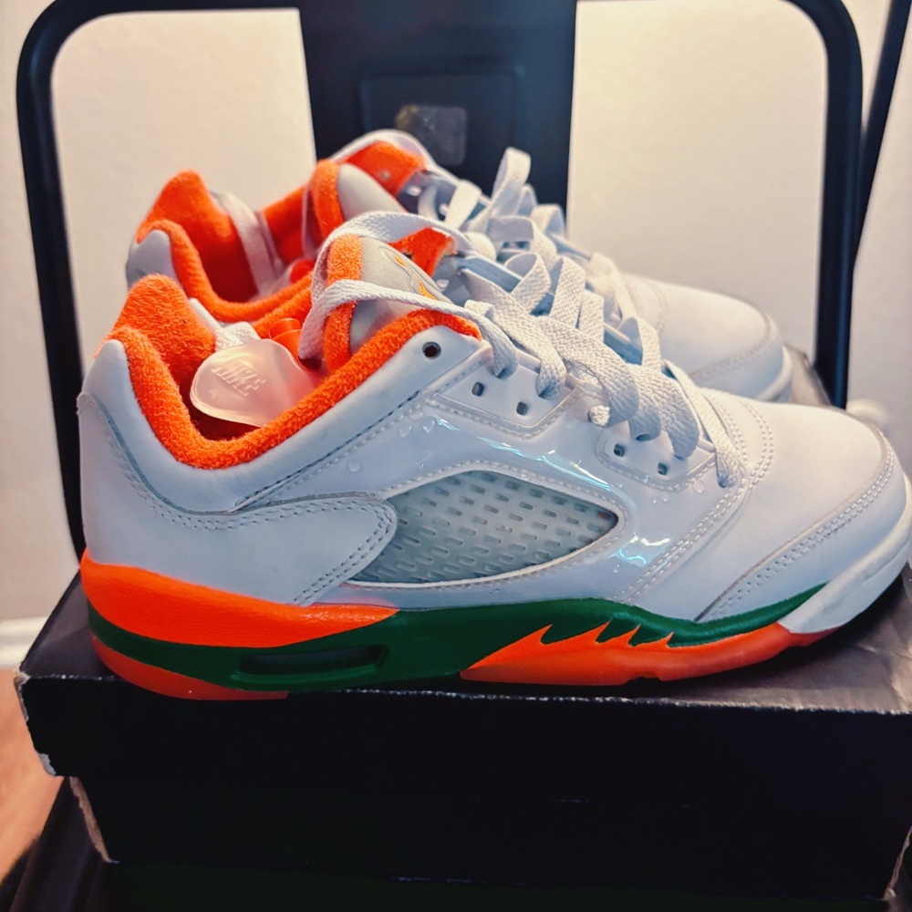 Jordan White and Orange Sneakers with Shark Tooth Design